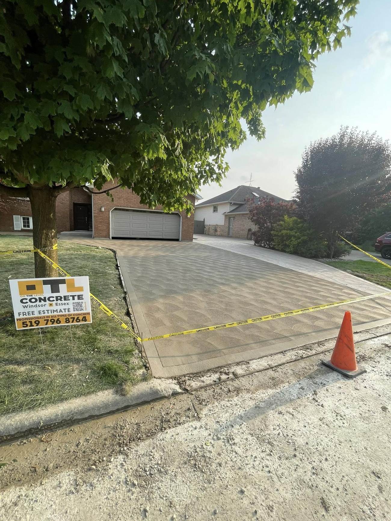 Completed driveway replacement with OTL site sign