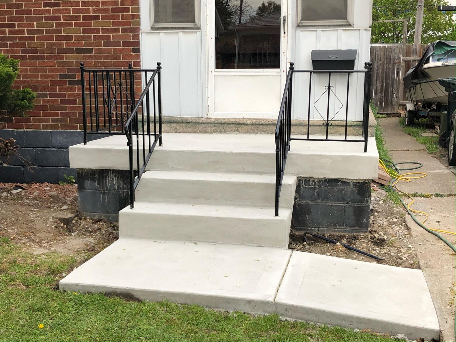 New concrete walkway and entrance steps