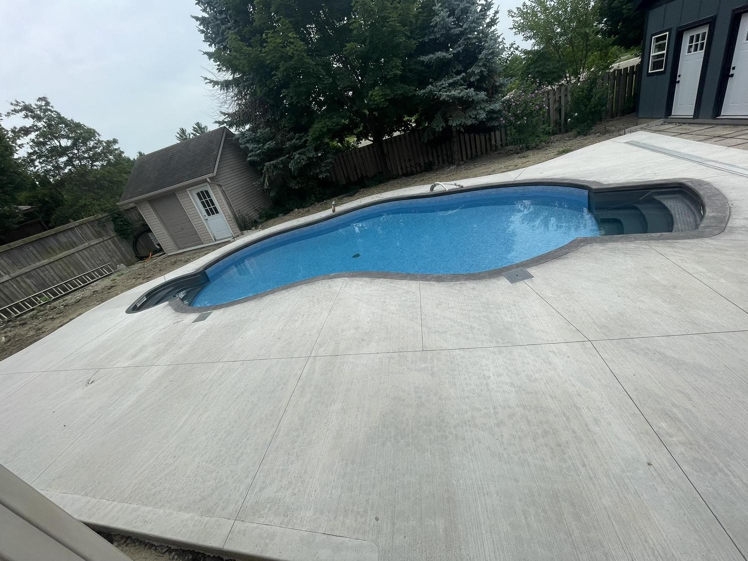 Large concrete pool deck surround