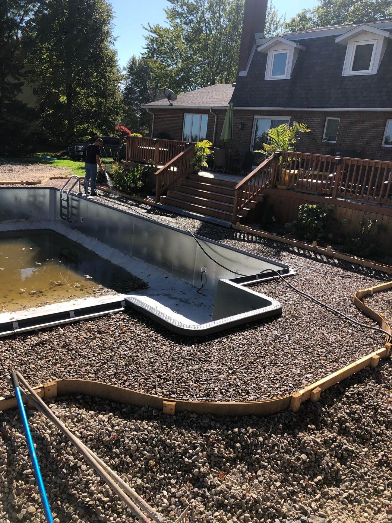Curved forms and gravel base ready for a pour