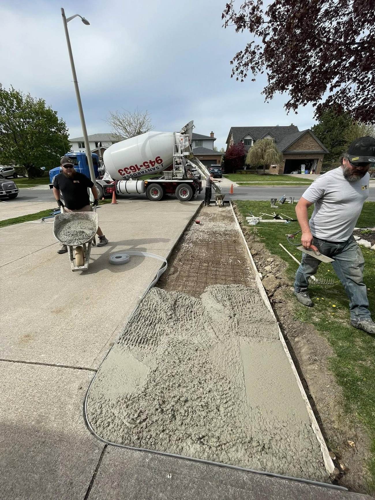 Crew placing concrete from the truck chute
