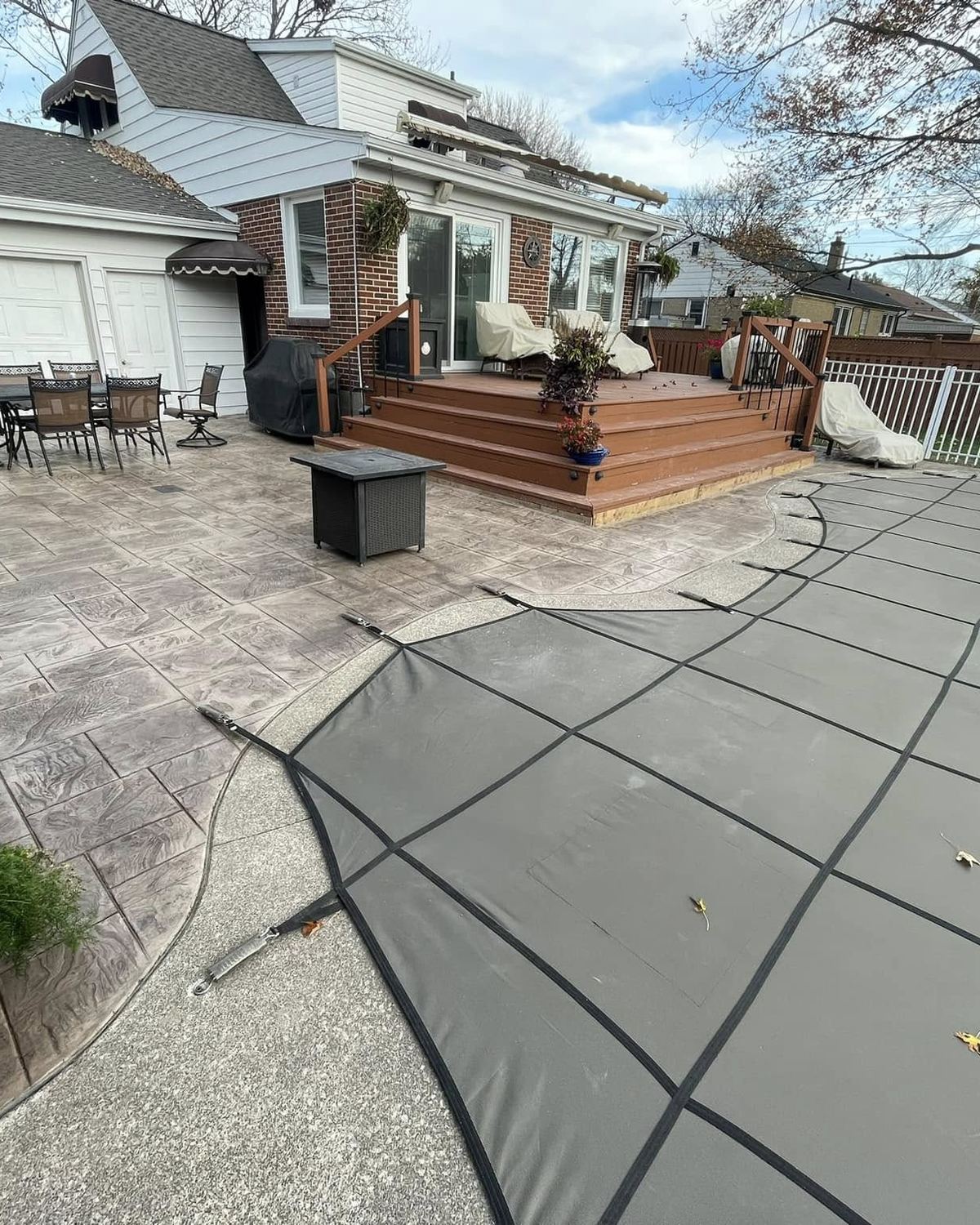 Stamped concrete patio and outdoor living space at a Windsor-Essex home